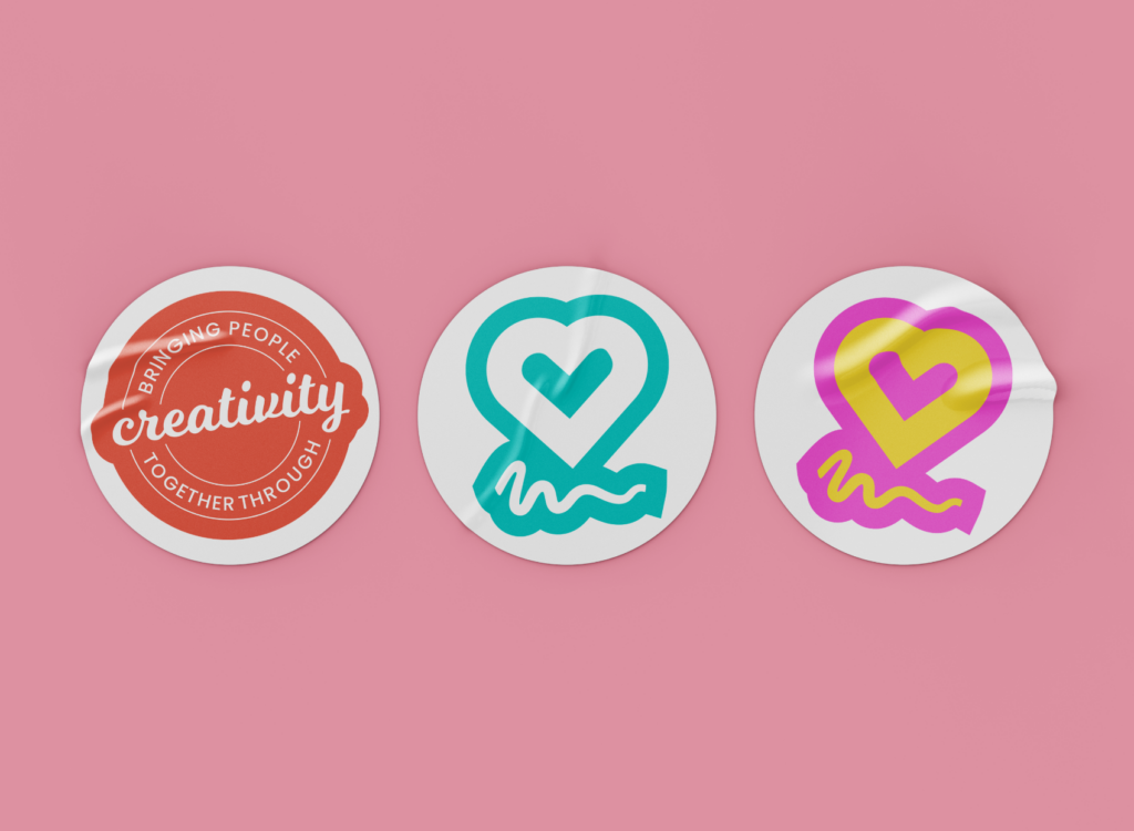 three stickers from left to right, the first one is red and round, the second is green heart shaped, and third is purple yellow heart shaped.